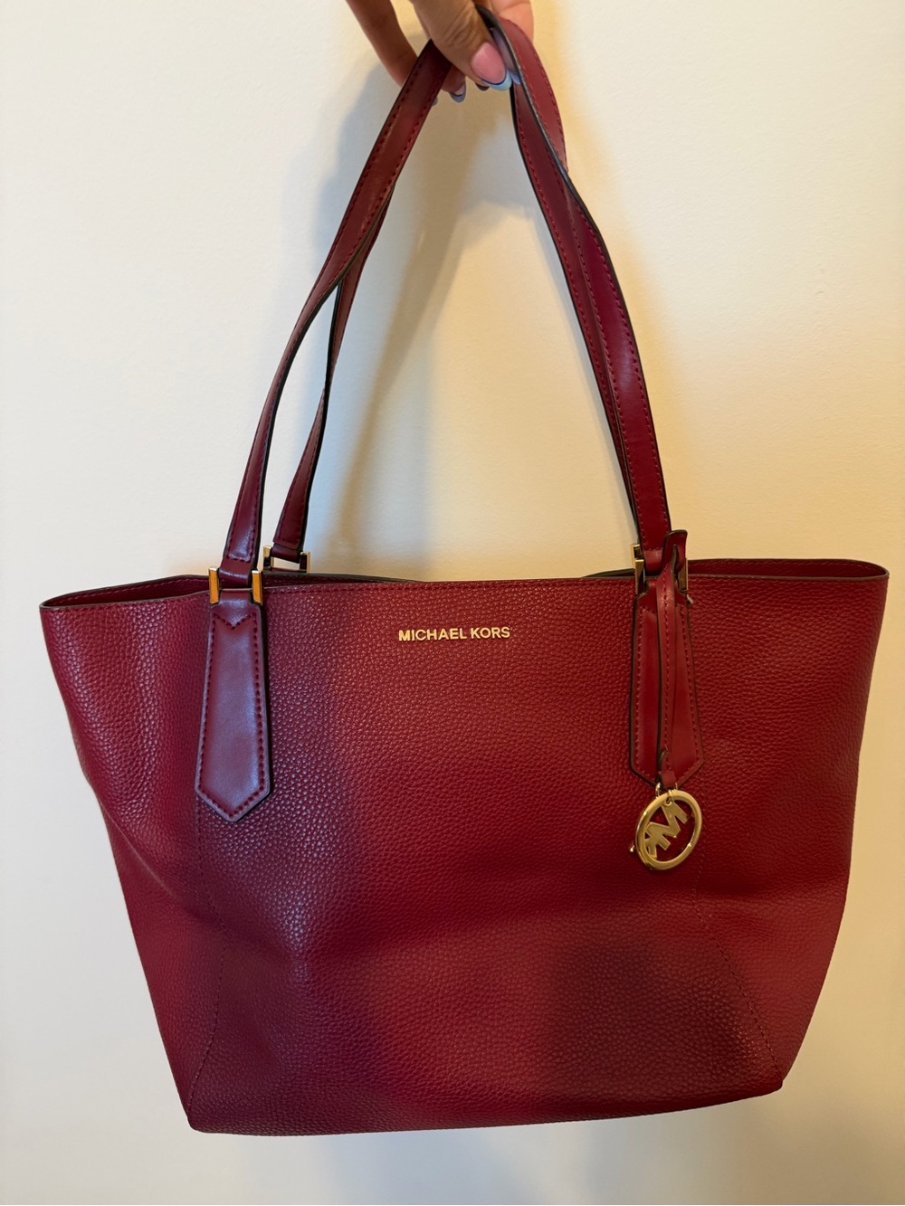 Michael Kors Wine Red Pebbled Leather Tote with Gold Logo Charm